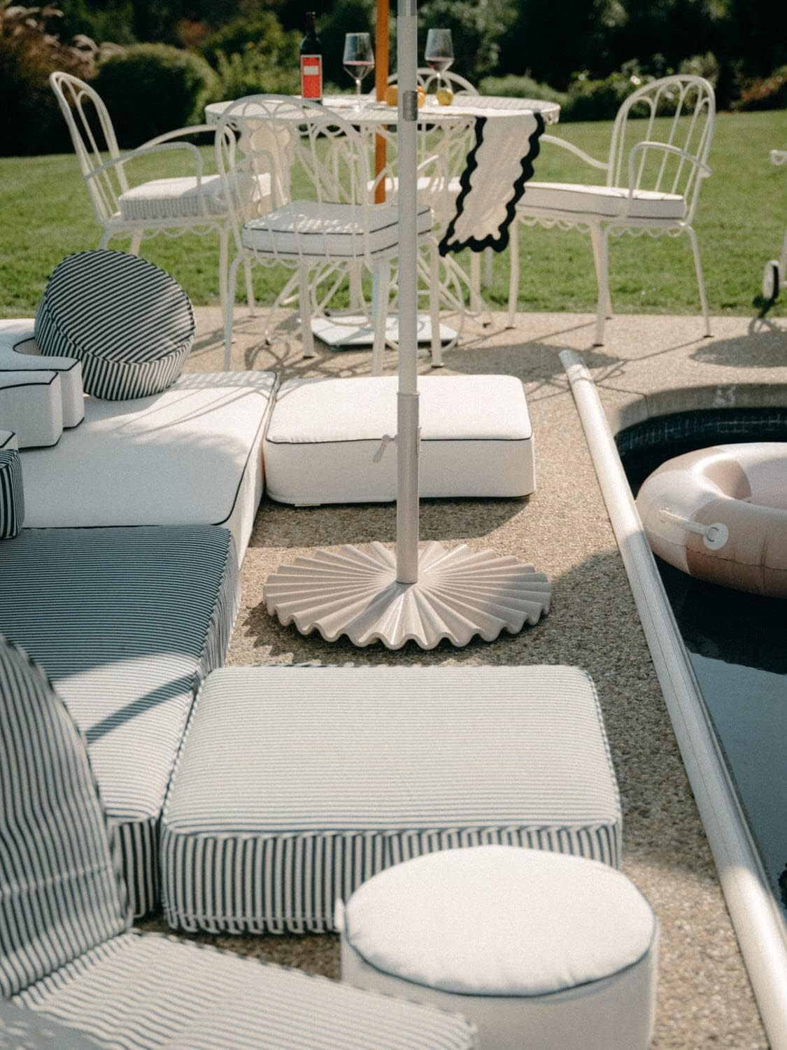 the Clamshell Base – Outdoor Patio Umbrella Base – Antique White, 55Lbs
