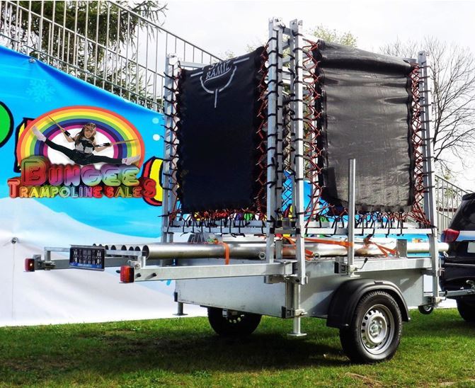 NEW FOR 2024 OUR DELUXE FULLY GALVANIZED 4 BED TRAILER MOUNTED BUNGEE TRAMPOLINE