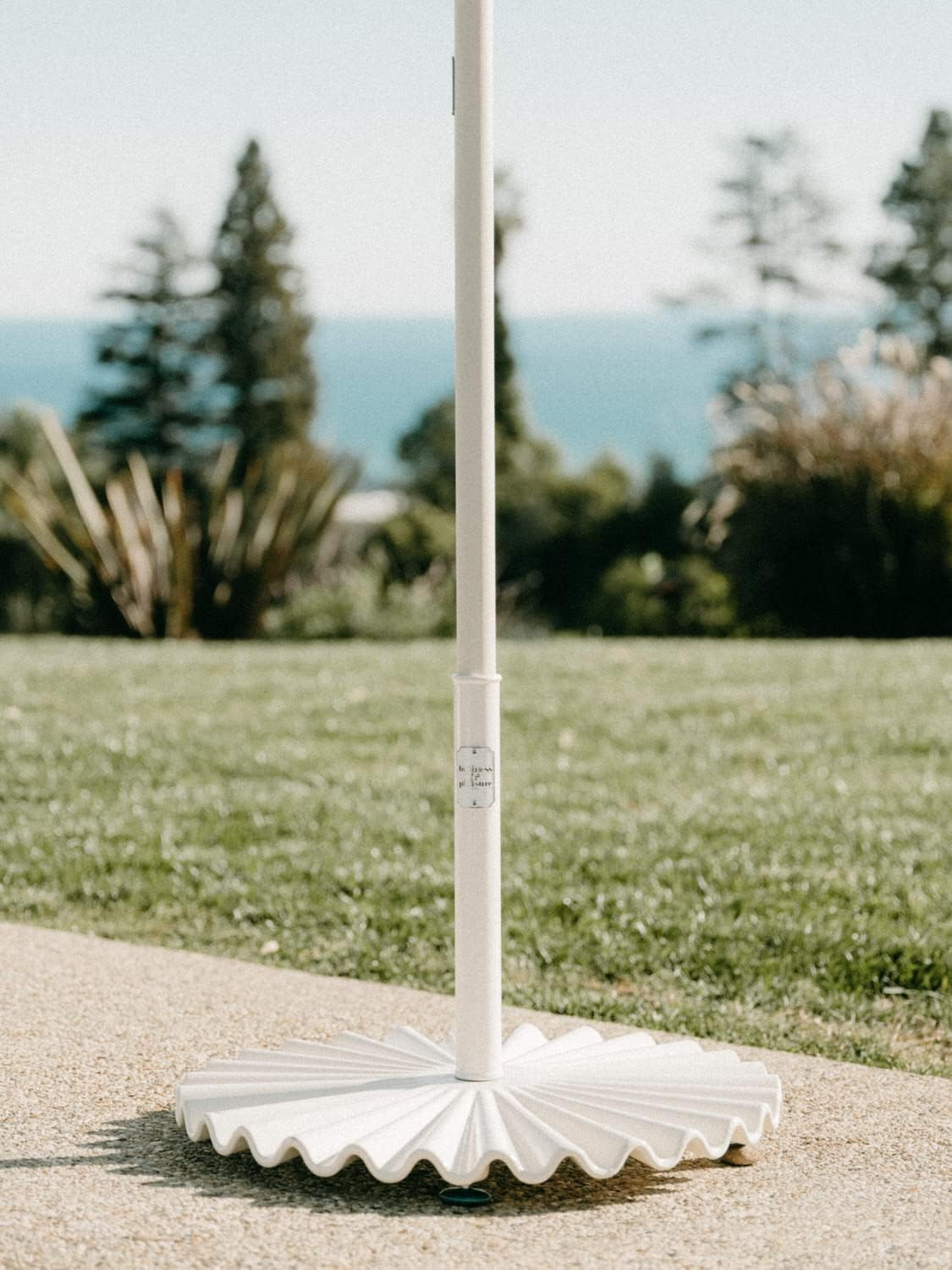 the Clamshell Base – Outdoor Patio Umbrella Base – Antique White, 55Lbs