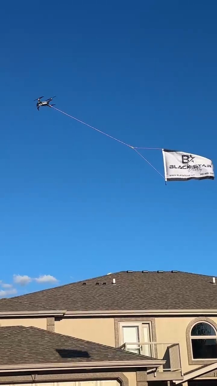 Flying Banners Pulled By Drones Mobile Billboards by Black Star Advertising